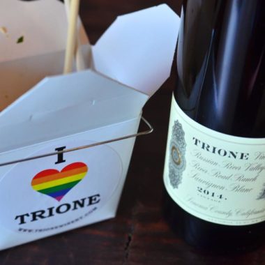 2014 Sauvignon Blanc and a white to go box with a Trione Winery sticker on the front