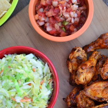 A fourth of July feast complete with BBQ wings and side dishes